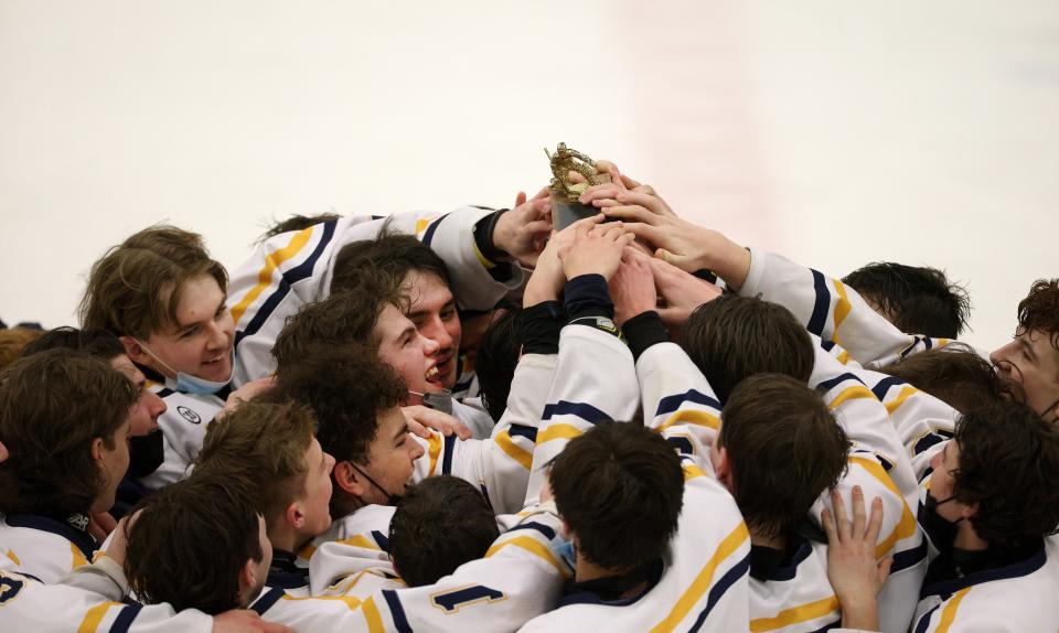 Webster Thomas celebrates winning the Class B championship with a 4-2 win over Aquinas .