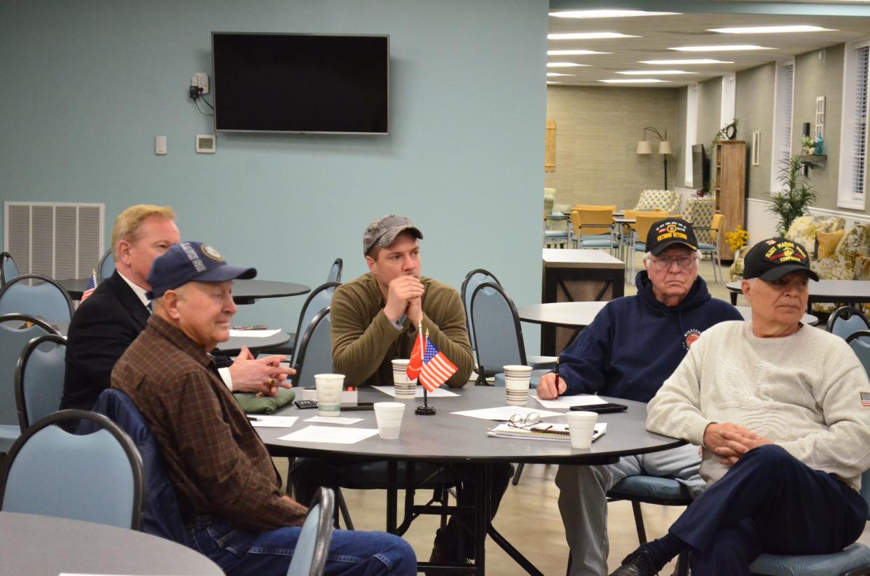 Marine Corps veterans meet at a Marine Corps League meeting in Fairview, Tenn., on March 23, 2022.