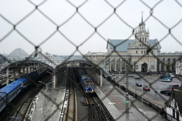 A commuter train carrying Chechen asylum seekers leaves the Belarusian border city of Brest for the Polish town of Terespol on December 21, 2016