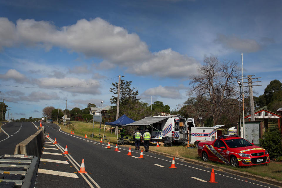 Queensland Transport Inspectors and police monitor the Queensland border in Wallangarra. Source: Getty