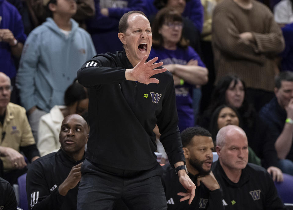 Washington coach Mike Hopkins yells to the team during the second half of the team's NCAA college basketball game against California, Saturday, Feb. 17, 2024, in Seattle. California won 82-80. (AP Photo/Stephen Brashear)