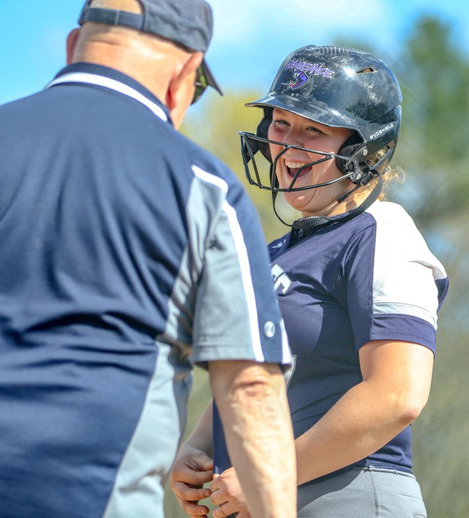 Plymouth North's Maggie Ladd has a laugh at third base during a game against Whitman-Hanson on Friday, May 13, 2022.