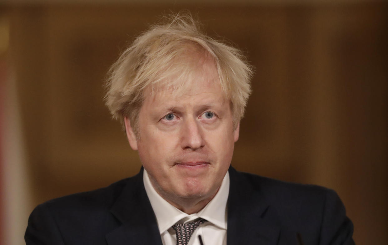 LONDON, ENGLAND - DECEMBER 16: United Kingdom Prime Minister Boris Johnson speaks during a news conference on the ongoing situation with the coronavirus pandemic, inside 10 Downing Street on December 16, 2020 in London, England. (Photo by Matt Dunham - WPA Pool/Getty Images)