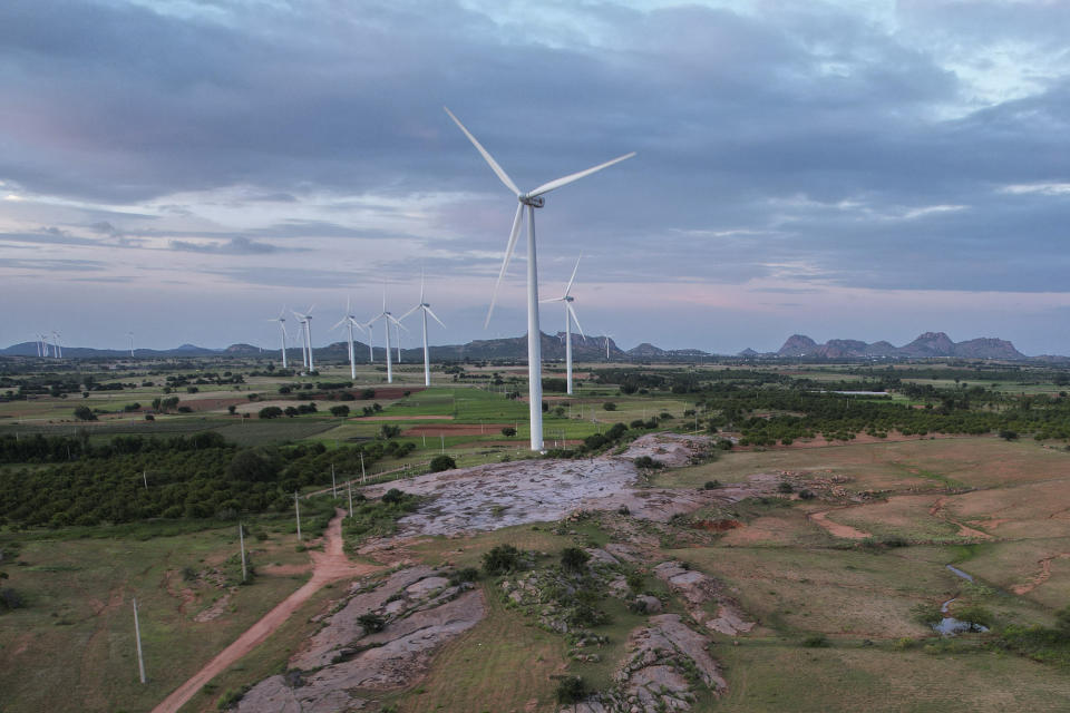 A windmill farm works in Anantapur district, Andhra Pradesh, India, Wednesday, Sept 14, 2022. India’s renewables sector is booming, with the country projected to add 35 to 40 gigawatts of renewable energy annually until 2030, enough to power up to 30 million more homes each year, a report said on Thursday, Oct. 13. (AP Photo/Rafiq Maqbool)