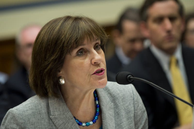 Lois Lerner, director of Exempt Organizations for the Internal Revenue Service, invokes her Fifth amendment right during a House Oversight and Governmental Reform Committee hearing on the IRS and it's targeting of conservative groups, on Capitol Hill on May 22, 2013, in Washington, D.C. File Photo by Kevin Dietsch/UPI