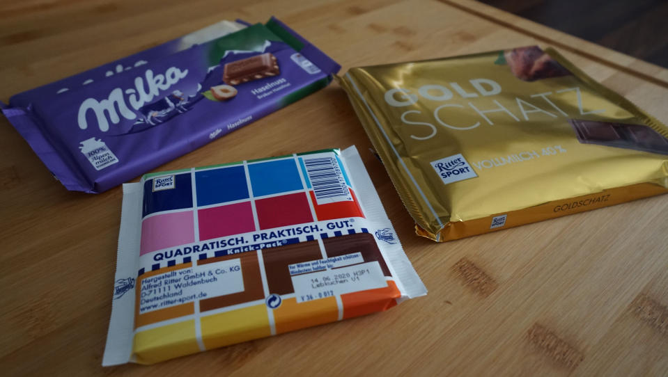 ILLUSTRATION - 14 May 2020, Berlin: Chocolate bars of the brands Ritter Sport and Milka are placed on a table. (scene posed) (to dpa "Milka disputes Ritter Sport's chocolate square before the Federal Supreme Court") Photo: Alexander Blum/dpa (Photo by Alexander Blum/picture alliance via Getty Images)