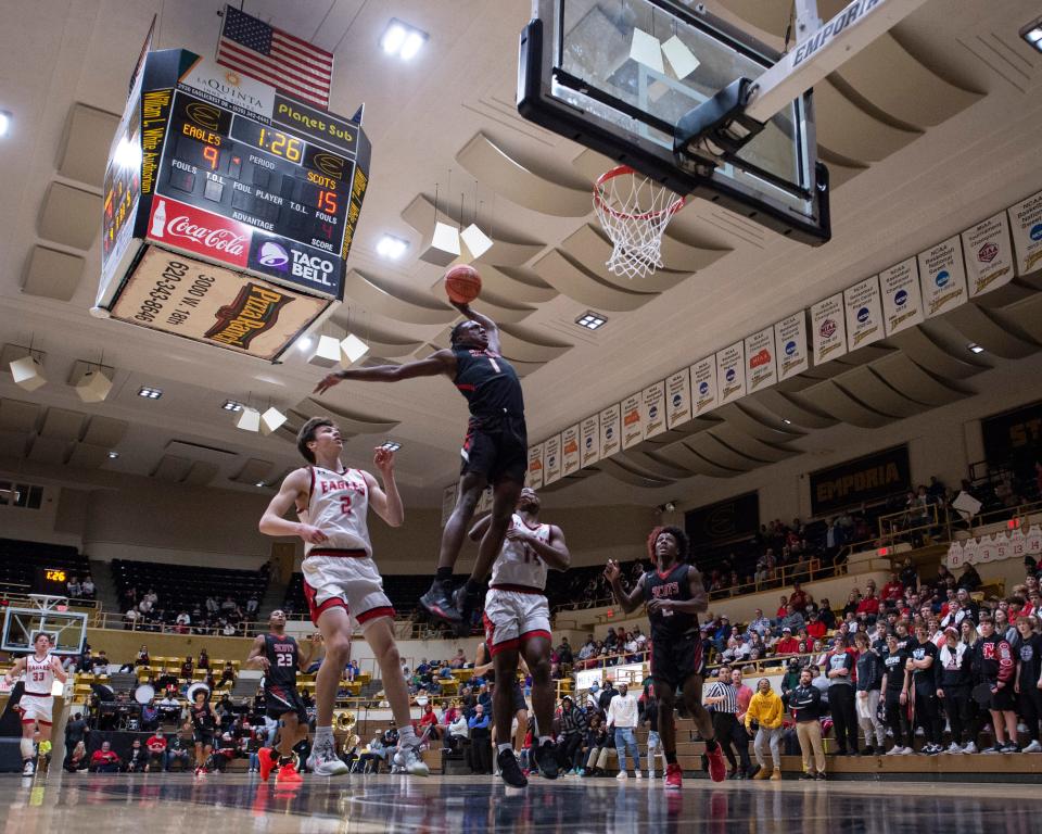 Highland Park Ketraleus Aldridge (1) attempted a dunk Wednesday at White Auditorium in Emporia.