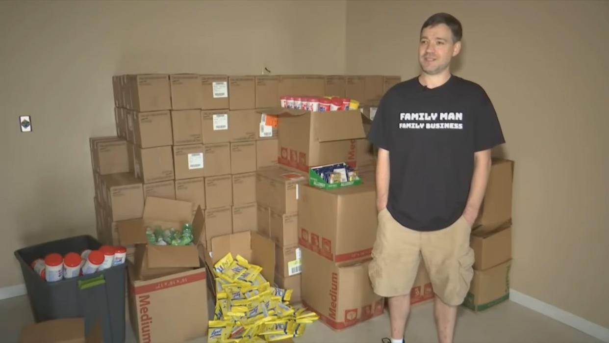 Matt Colvin stands with medical supplies that he said he purchased from stores in Tennessee and Kentucky to sell online for a profit. (Photo: WRCB)