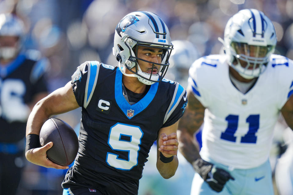 Carolina Panthers quarterback Bryce Young runs against the Dallas Cowboys during the first half of an NFL football game Sunday, Nov. 19, 2023, in Charlotte, N.C. (AP Photo/Rusty Jones)