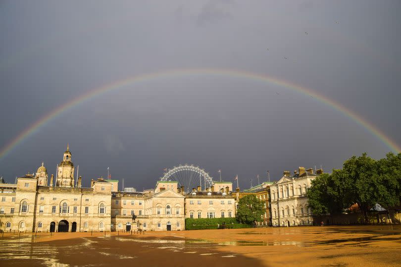 LONDON, UNITED KINGDOM - 2021/07/28: A rainbow appears over Horse Guards Parade ground after a day of heavy rain in London. (Photo by Vuk Valcic/SOPA Images/LightRocket via Getty Images)