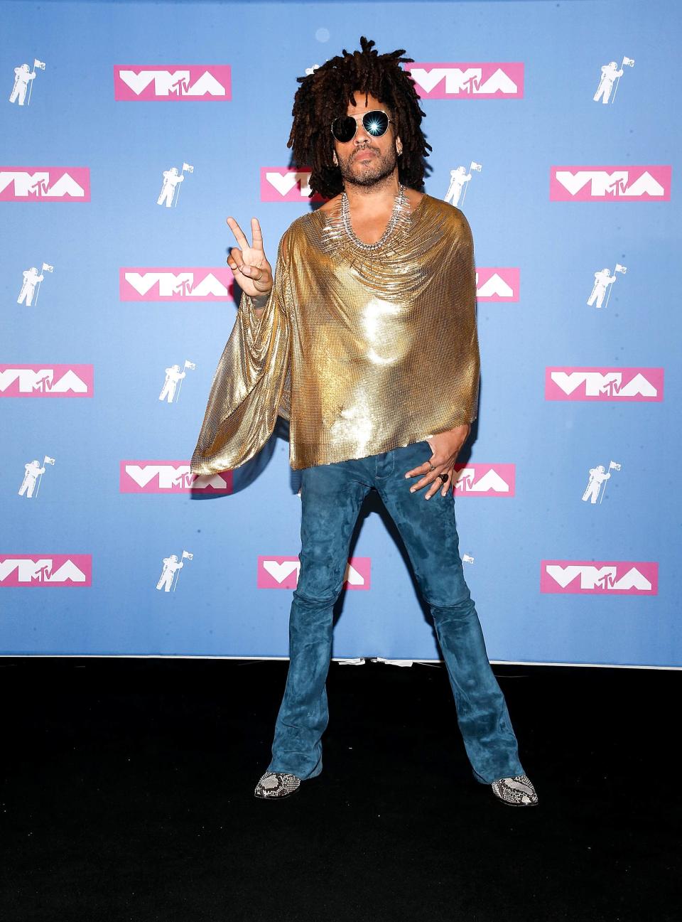Lenny Kravitz poses in the press room at the 2018 MTV Video Music Awards.