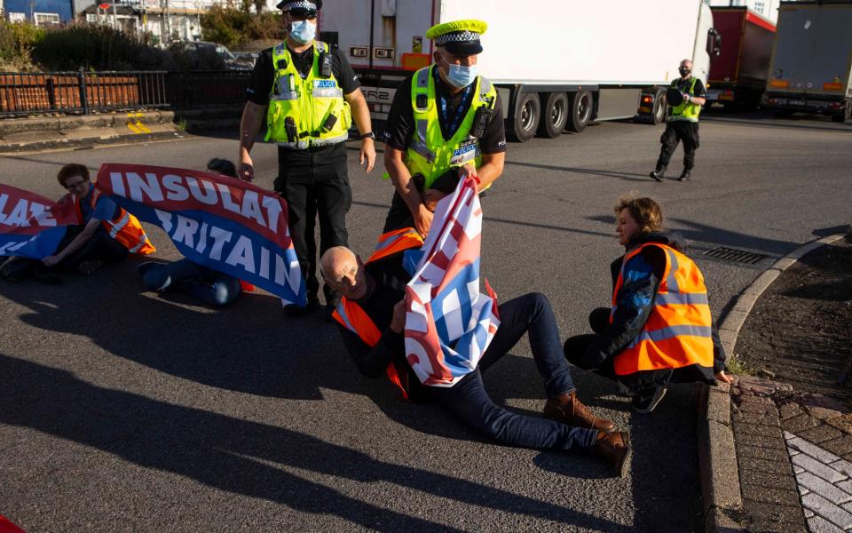 Police attempt to remove Insulate Britain protesters from blocking the port - Jamie Lorriman