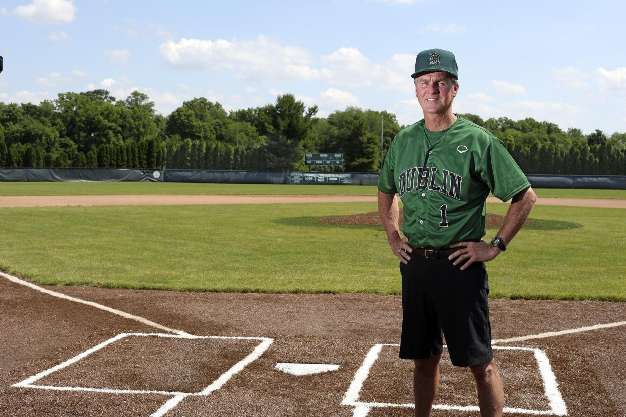 Former Coffman baseball coach Tim Saunders poses at the school's baseball field in 2020. He will be inducted into the American Baseball Coaches Association Hall of Fame on Jan. 6 in Nashville, Tennessee.