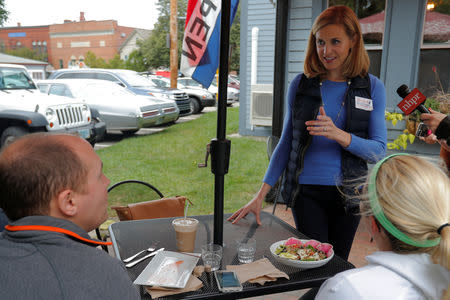 Democratic candidate for the U.S. Congress Maura Sullivan greets voters at Laney & Lu in Exeter, New Hampshire, U.S., September 10, 2018. REUTERS/Brian Snyder