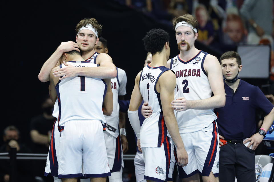 Gonzaga's Jalen Suggs (L), Corey Kispert, Andrew Nembhard and Drew Timme react after losing the national championship game on Monday. (Tim Nwachukwu/Getty Images)
