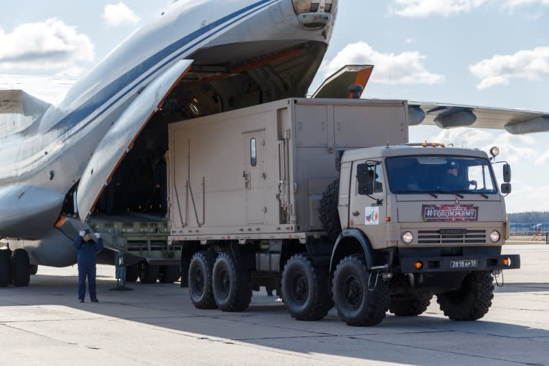 The Russian military send medical supply to Italy at an airdrome in Moscow region