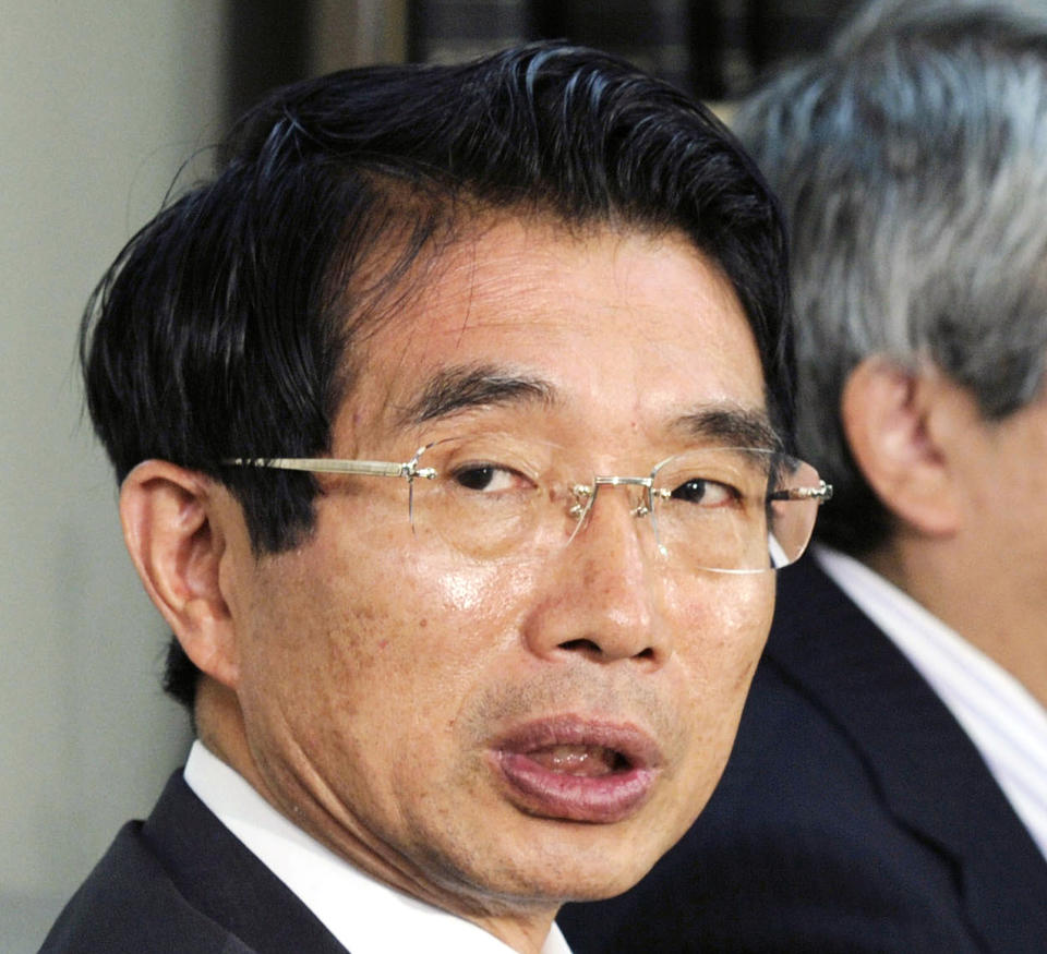 In this May 9, 2012, photo, lawyer Junichiro Hironaka speaks at the press cub of courthouse in Tokyo. The newly appointed star defender for former Nissan chairman Carlos Ghosn said Wednesday, Feb. 20, 2019 he believes the case against his client does “not meet international standards.” Hironaka also said that he believed Ghosn’s trial on charges of falsifying financial reporting and breach of trust might not begin until after the summer. (Kyodo News via AP)