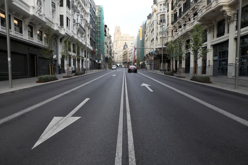 The almost empty Gran Via avenue is seen during partial lockdown, as part of a 15-day state of emergency to combat the coronavirus outbreak in Madrid