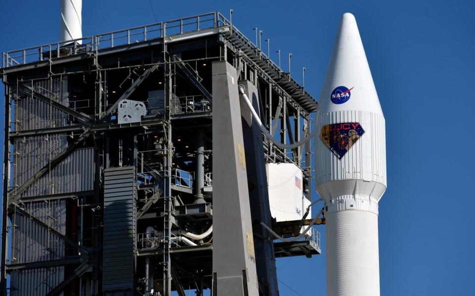 The capsule with NASA's Lucy spacecraft, atop a United Launch Alliance Atlas 5 rocket for a mission to study the Trojan asteroids - Steve Nesius /REUTERS 