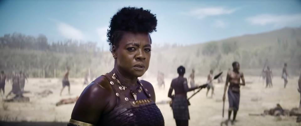 Viola Davis stands in a field