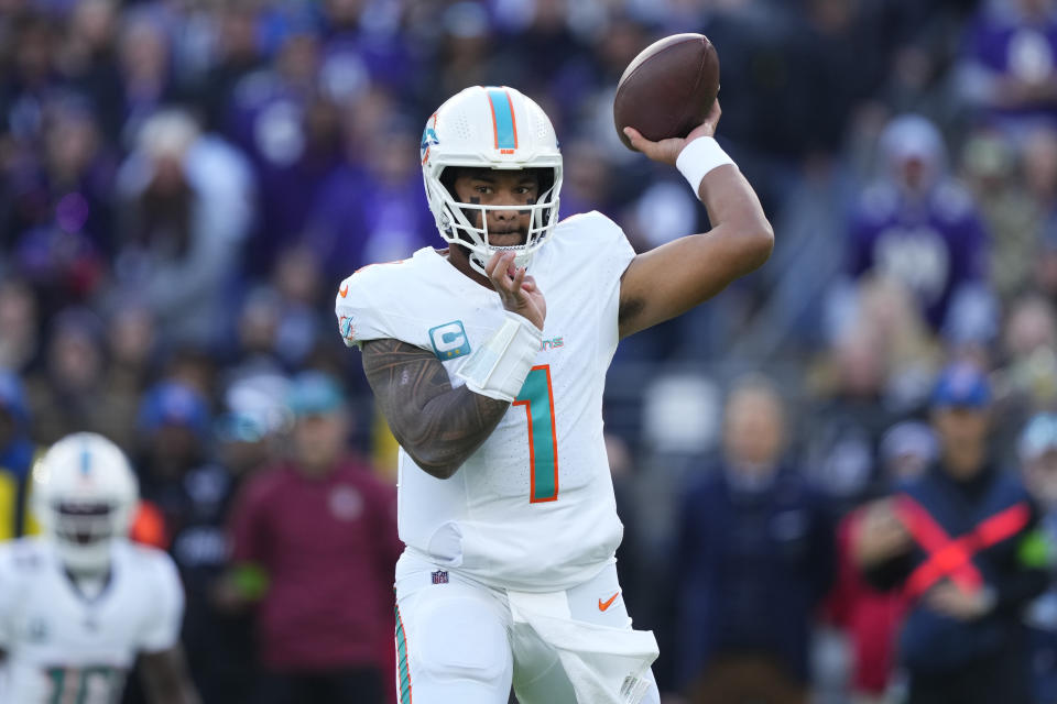 Miami Dolphins quarterback Tua Tagovailoa (1) looks to pass against the Baltimore Ravens during the first half of an NFL football game in Baltimore, Sunday, Dec. 31, 2023. (AP Photo/Matt Rourke)