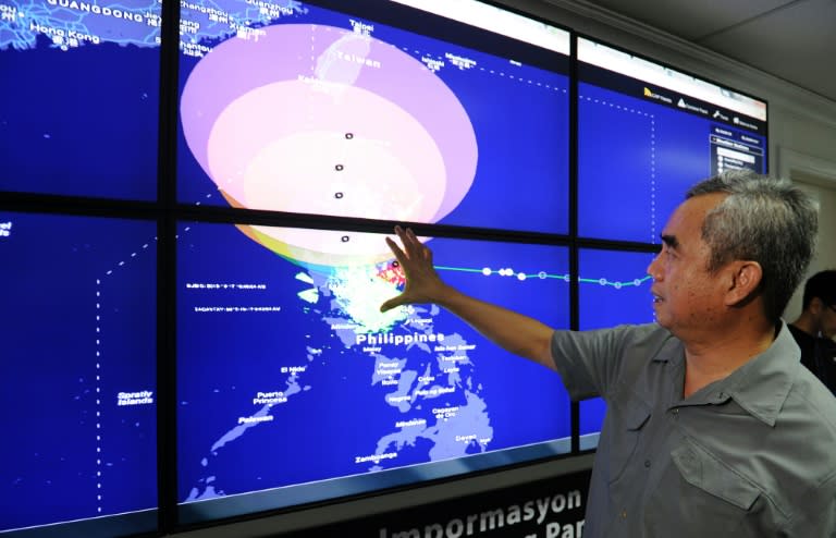 Undersecretary Alexander Pama, head of the National Disaster Risk Reduction and Management Council, gives a briefing on Typhoon Koppu in suburban Manila on October 17, 2015