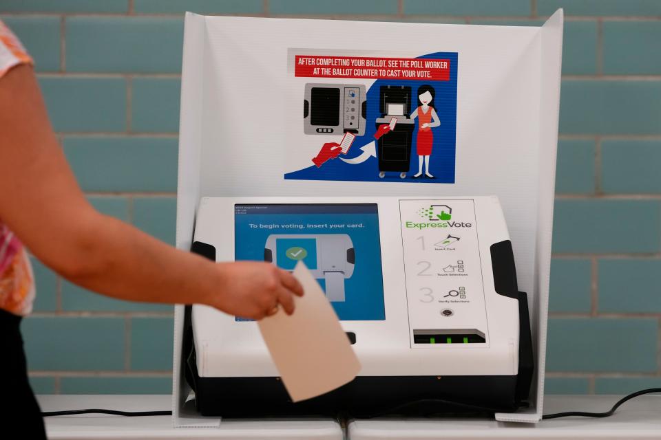 A voting machine stands ready for voters casting their ballots during the Aug. 8 special election at Schiller Recreation Center in Columbus.
