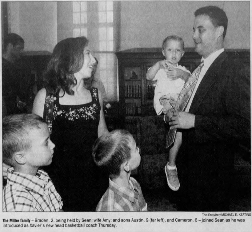 Sean Miller with his wife, Amy, and three children at his introductory press conference as Xavier basketball coach on Thursday, July 8, 2004.