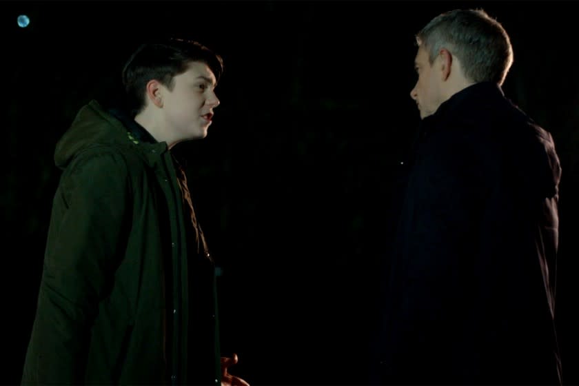 Alex Eastwood, left, and Martin Freeman in a night scene of "Breeders" on FX.