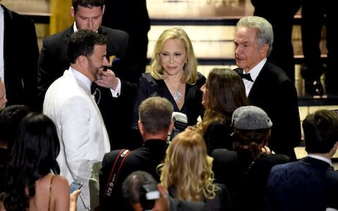 Jimmy Kimmell, Faye Dunaway and Warren Beatty on stage at the 2017 Oscars - Credit: getty