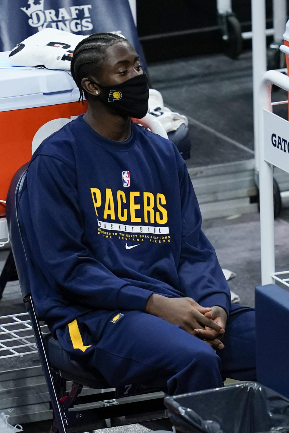 Indiana Pacers' Caris LeVert watches from the bench during the first half of an NBA basketball game against the Dallas Mavericks, Wednesday, Jan. 20, 2021, in Indianapolis. (AP Photo/Darron Cummings)