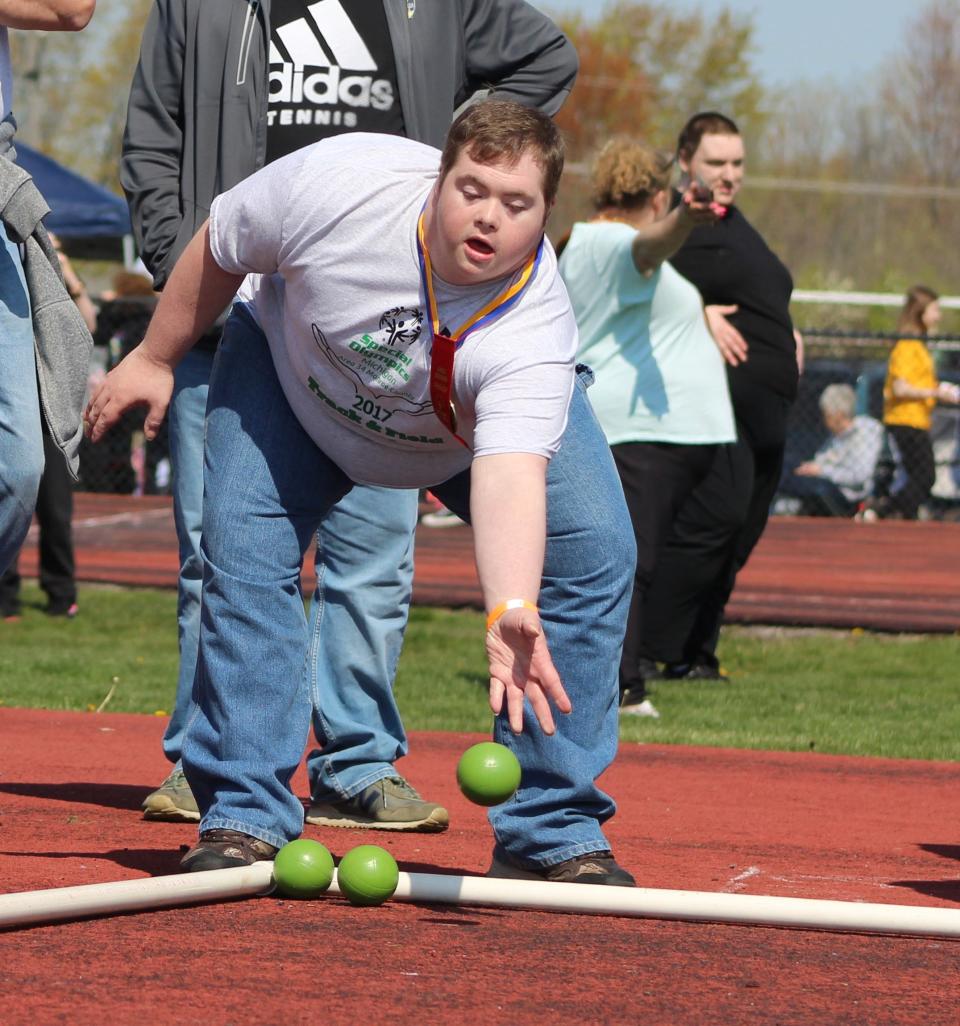 DJ Barber, 27, showed his skills at bocce ball and secured a blue ribbon at this year's Monroe County Special Olympics.