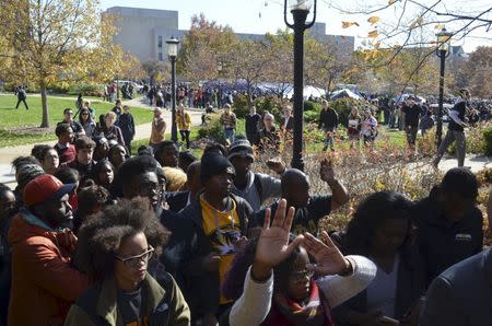 Students listen at a press conference at Traditions Plaza at Carnahan Quad, on the University of Missouri campus in Columbia, Missouri, November 9, 2015. REUTERS/The Maneater/Elizabeth Loutfi