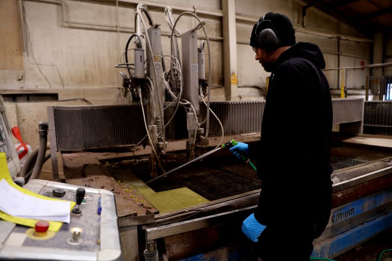 Man works in the Farrat factory in Altrincham