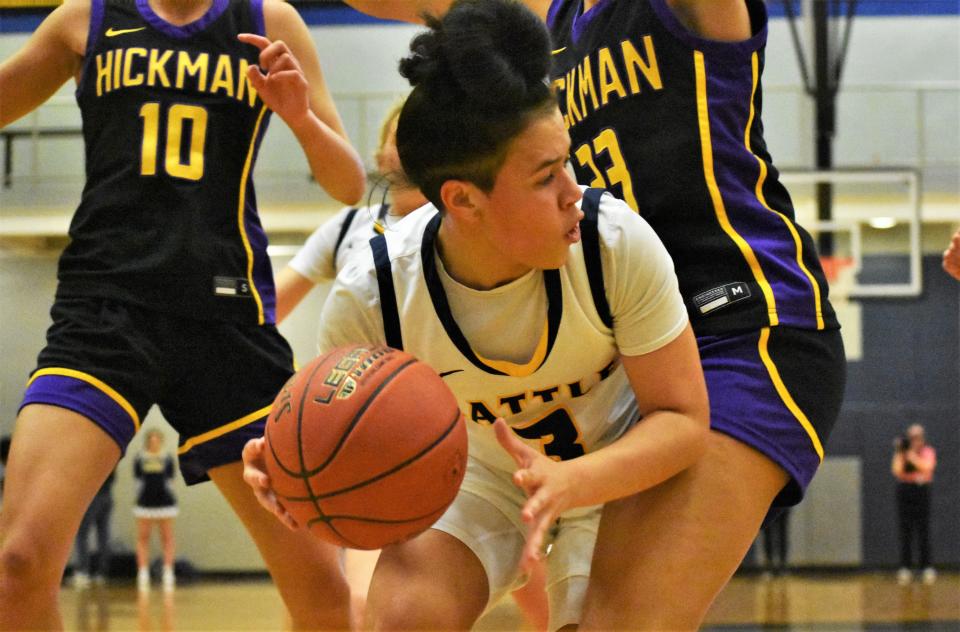 Battle guard Tayla Robinson (3) looks to pass during a game between the Spartans and Hickman on Feb. 17, 2023, at Battle High School.