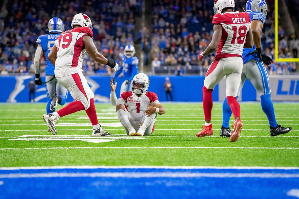 Arizona Cardinals quarterback Kyler Murray (1) is helped up off the turf by guard Josh Jones (79) during the second half against the Detroit Lions at Ford Field.