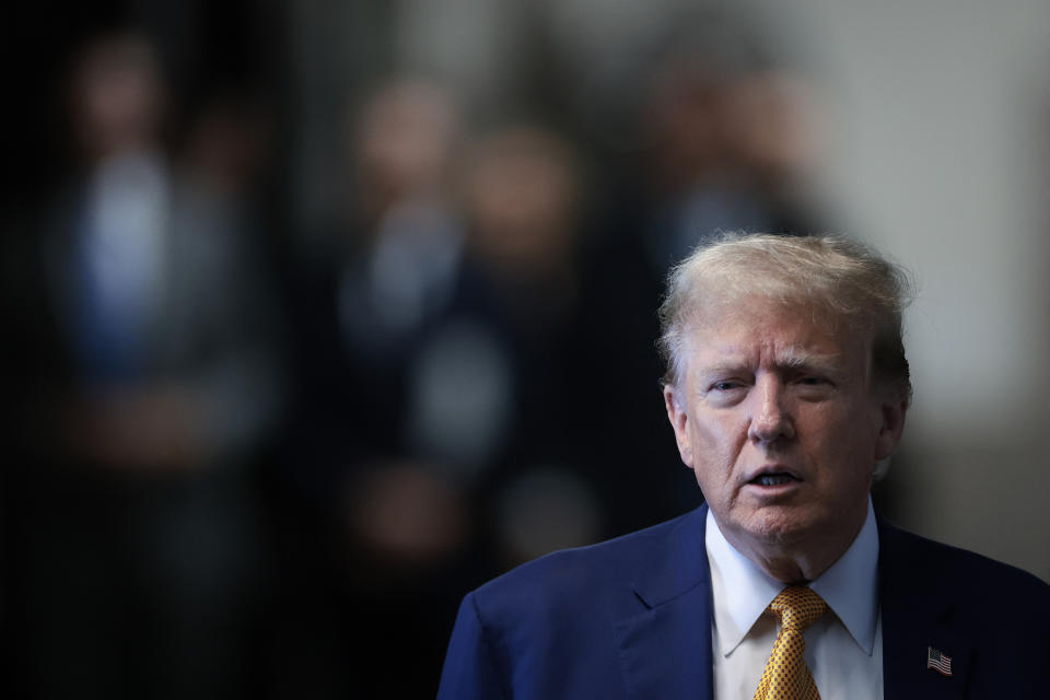 Former US President Donald Trump with his lawyer Todd Blanche, speaks to the press before his trial for allegedly covering up hush money payments linked to extramarital affairs, at Manhattan Criminal Court in New York City, on May 7, 2024. Stormy Daniels, the porn actress at the heart of  Trump's hush money trial, was due to testify against the ex-president May 7, US media said, in a blockbuster moment in the courtroom drama rocking the scandal-plagued Republican's attempt to recapture the White House. (Photo by Win McNamee / POOL / AFP) (Photo by WIN MCNAMEE/POOL/AFP via Getty Images)