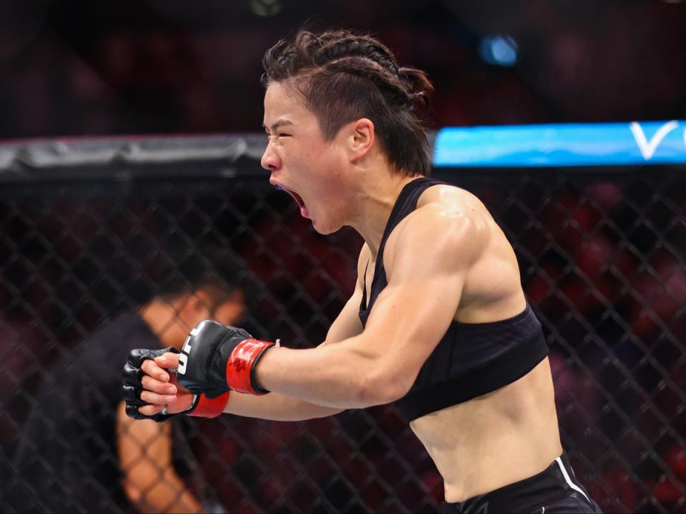 Weili Zhang celebrates her spinning back fist knockout of Joanna Jedrzejczyk (Getty Images)