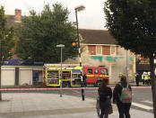 Firefighters arrive to battle a fire at a department store in Chingford, London, Britain August 23, 2017 in this still image obtained from social media. Jonathan Boyce/@JonathanBoyce24 via REUTERS THIS IMAGE HAS BEEN SUPPLIED BY A THIRD PARTY. NO RESALES. NO ARCHIVES. MANDATORY CREDIT