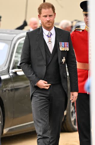 <p>Andy Stenning - WPA Pool/Getty Images</p> Prince Harry arrives for the Coronation of King Charles III and Queen Camilla at Westminster Abbey on May 6, 2023, in London, England.