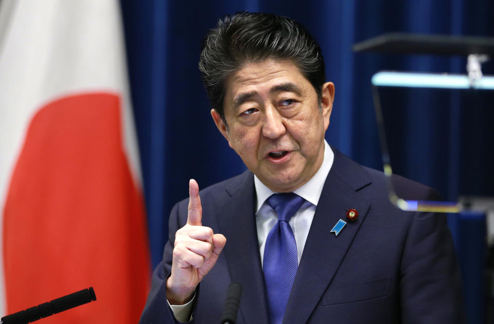 FILE - Japan's Prime Minister Shinzo Abe speaks during a press conference at the prime minister's official residence in Tokyo, on Sept. 25, 2017. Japan’s NHK television says former Prime Minister Shinzo Abe has died after being shot during a campaign speech. Abe was shot from behind minutes after he started his speech Friday, July 8, 2022, in Nara in western Japan. He was airlifted to a hospital for emergency treatment but was not breathing and his heart had stopped. He was pronounced dead later at the hospital.(AP Photo/Shizuo KambayashiK, File)