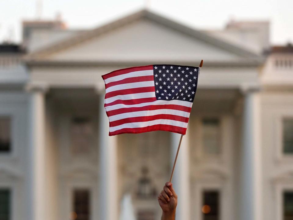 In this September 2017 file photo, a flag is waved outside the White House, in Washington: AP