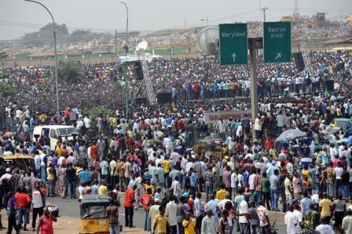 Thousands of fuel protesters gather at Gani Fawehinmi Park in Lagos. Tens of thousands of protesting Nigerians defied an order to end a three-day-old strike Wednesday as unions threatened oil production and a mob rampaged in one city, leaving a police officer dead