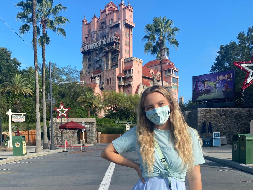 kayleigh standing on hollywood boulevard in hollywood studios in front of tower of terror