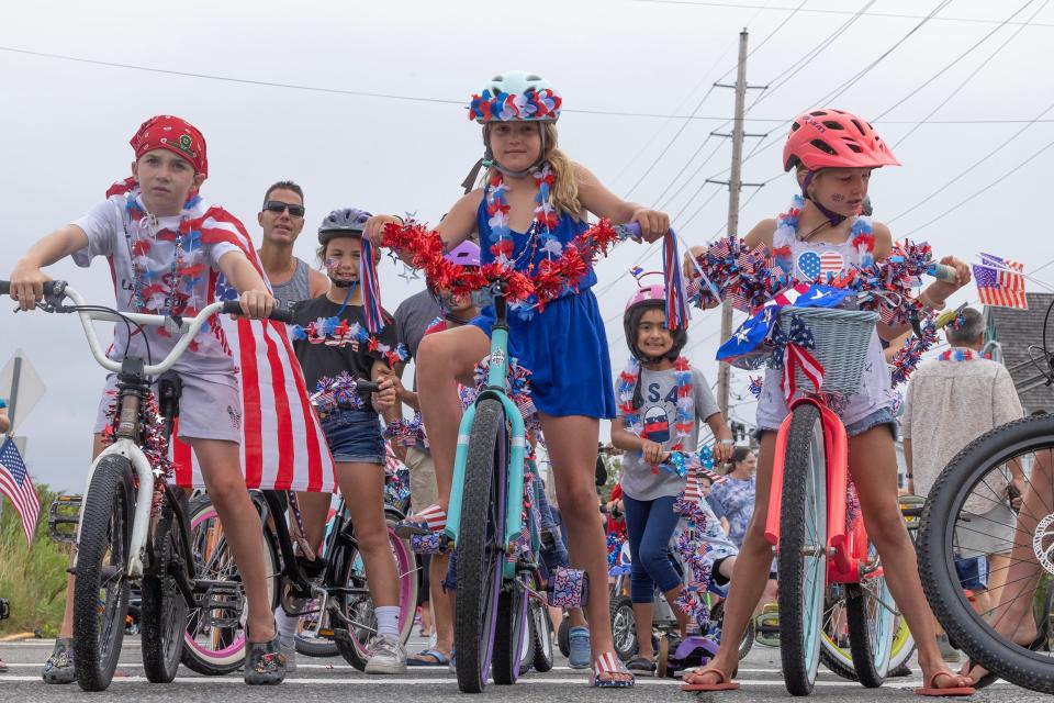 Riders line up for the start of the July Fourth bike parade in Seaside Park.
