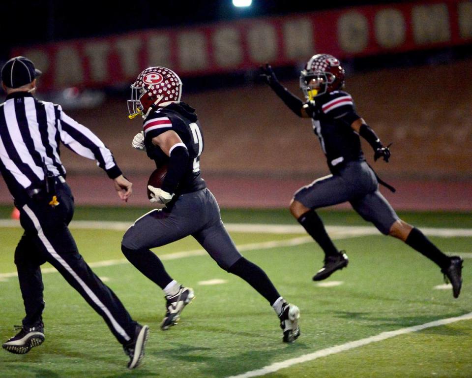 Patterson receiver Noah Cozart (2) runs to the endzone to score a touchdown during a Division IV Sac Joaquin Section Football Playoff game between Patterson and Kimball at Patterson High School in Patterson CA on November 10, 2023.