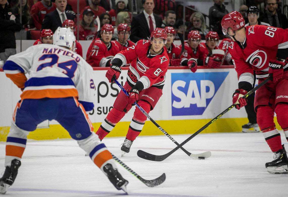 Carolina Hurricanes Jesperi Kotkaniemi (82) passes to Martin Necas (88) in the first period against the New York Islanders on Tuesday, April 17, 2023 at PNC Arena in Raleigh, N.C.