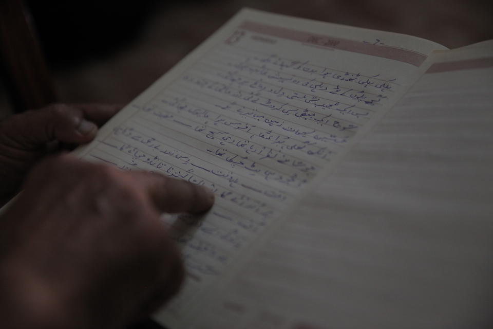 In this Aug. 21, 2019, photo, Kashmiri Hindu Vijay Kaul, at his residence in New Delhi, India recites lines from a poem he wrote in 2015 when he visited his ancestral home near Srinagar in Indian-administered Kashmir. Hundreds of thousands Kashmiri Hindus fled from their homes in late 80’s and early 90’s when separatist insurgency started targeting and killing Indian government officials, security forces, and eventually Kashmiri Hindus. Nearly 30 years after their exodus, the ghost of insurgency still haunts many Kashmiri Hindus. (AP Photo/Rishabh R. Jain.)