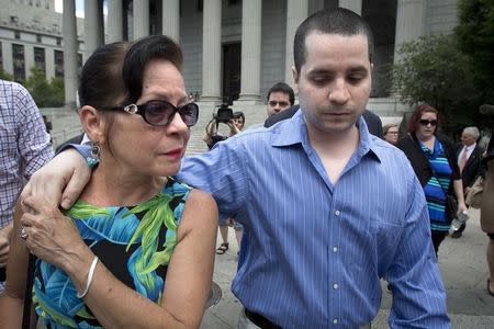 Former New York City police officer Gilberto Valle, dubbed by local media as the "Cannibal Cop," and his mother Elizabeth Valle leave the U.S. District Court for the Southern District of New York in Lower Manhattan July 1, 2014. REUTERS/Carlo Allegri