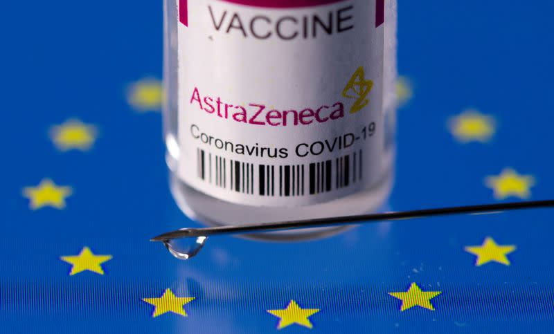 FILE PHOTO: Vial labelled "AstraZeneca coronavirus disease (COVID-19) vaccine" placed on displayed EU flag is seen in this illustration picture